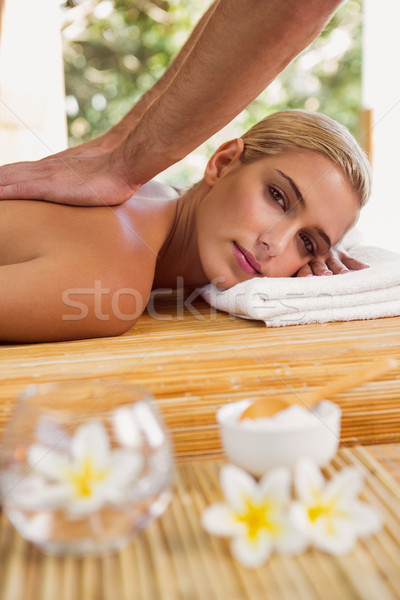Woman receiving back massage at spa center Stock photo © wavebreak_media