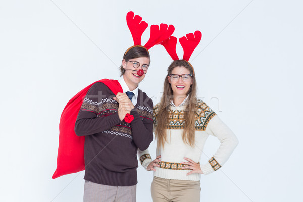 Happy geeky hipster couple with stag headband Stock photo © wavebreak_media