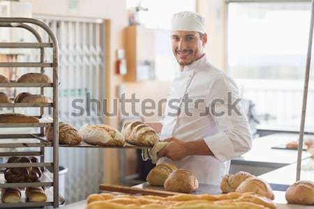 Smiling male chef with cooked food in kitchen Stock photo © wavebreak_media