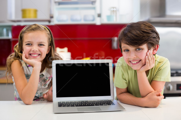 Souriant portable cuisine portrait maison [[stock_photo]] © wavebreak_media