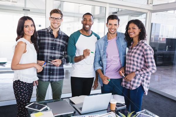 Portrait of young business team standing together Stock photo © wavebreak_media