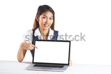 Portret zâmbitor femeie de afaceri laptop în picioare Imagine de stoc © wavebreak_media