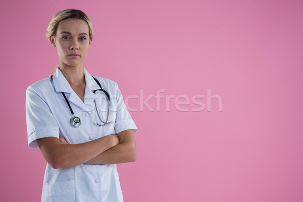 Stock photo: Portrait of female doctor with arms crossed