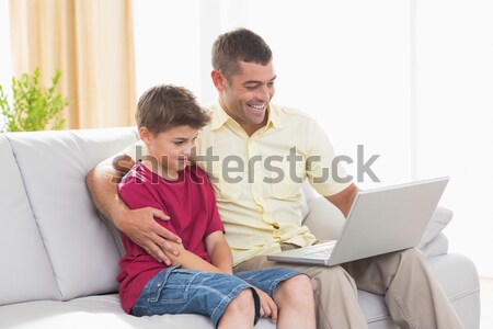 Father and son using laptop Stock photo © wavebreak_media