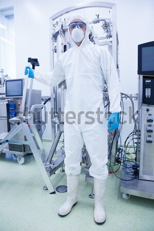 Stock photo: Doctor placing an oxygen mask on the face of a patient