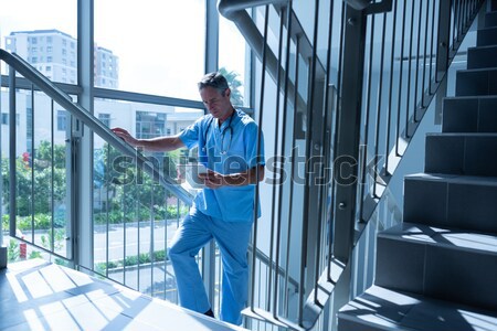 Nurse running in hospital corridor Stock photo © wavebreak_media