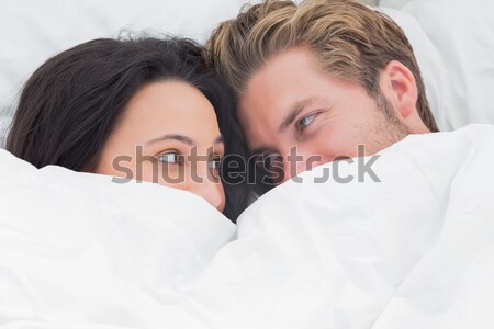 Pareja dormir cama junto mujer sexy Foto stock © wavebreak_media