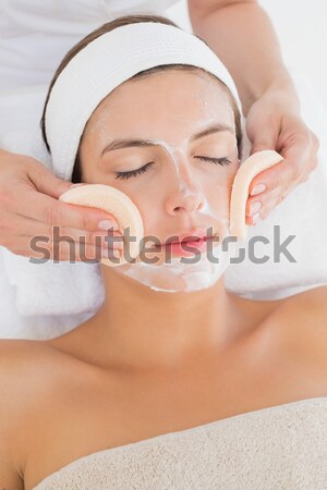 Positive woman relaxing with an head massage Stock photo © wavebreak_media