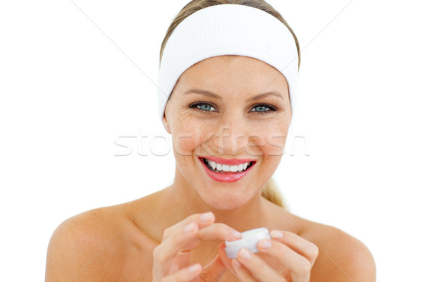 Delighted woman applying lip balm Stock photo © wavebreak_media