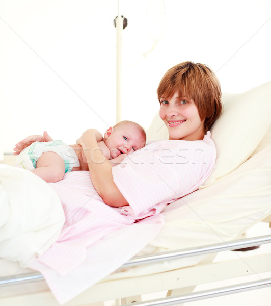 Mother holding her newborn baby Stock photo © wavebreak_media