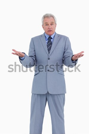 Irritated mature tradesman against a white background Stock photo © wavebreak_media