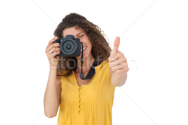 Female photographer gesturing thumbs up Stock photo © wavebreak_media