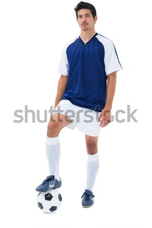 Football player in blue standing with the ball Stock photo © wavebreak_media