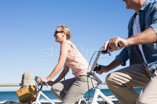 Szczęśliwy przypadkowy para rowerów molo Zdjęcia stock © wavebreak_media