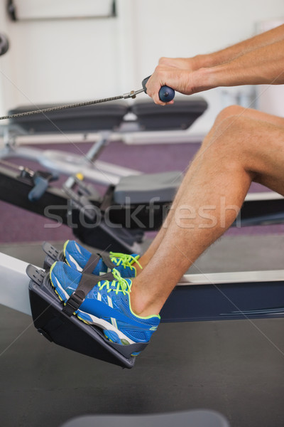 Low section of man using resistance band in gym Stock photo © wavebreak_media
