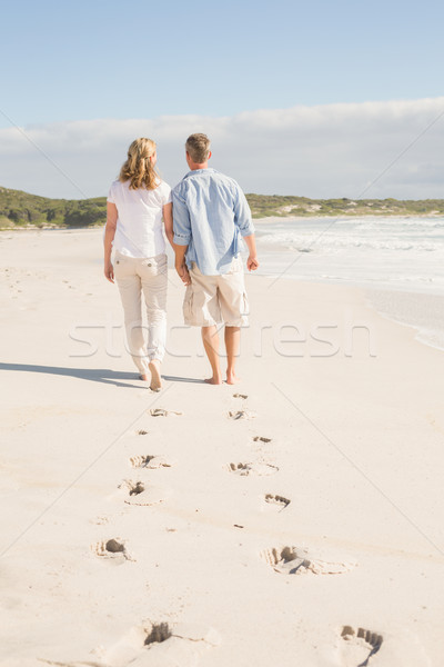 Gelukkig paar lopen holding handen strand vrijheid Stockfoto © wavebreak_media