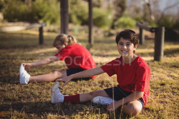 Glücklich Kinder Dehnung Ausübung Hindernisstrecke Stock foto © wavebreak_media