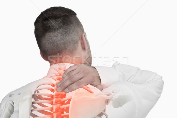 Digital composite of highlighted spine of man with back pain Stock photo © wavebreak_media