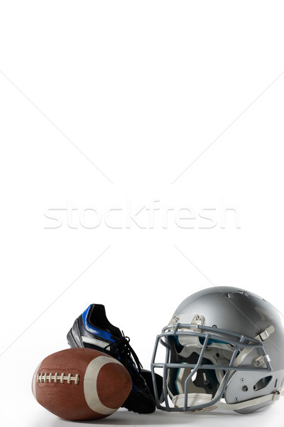 American football with sports helmet and shoe Stock photo © wavebreak_media