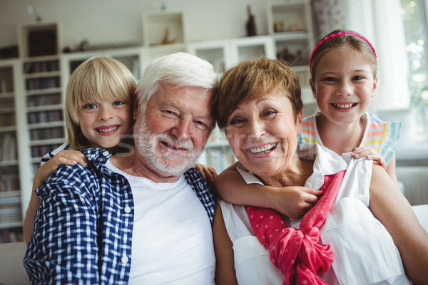 Portrait grands-parents souriant petits enfants maison homme [[stock_photo]] © wavebreak_media