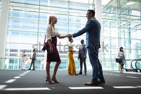Businesspeople forming a huddle in office premises Stock photo © wavebreak_media
