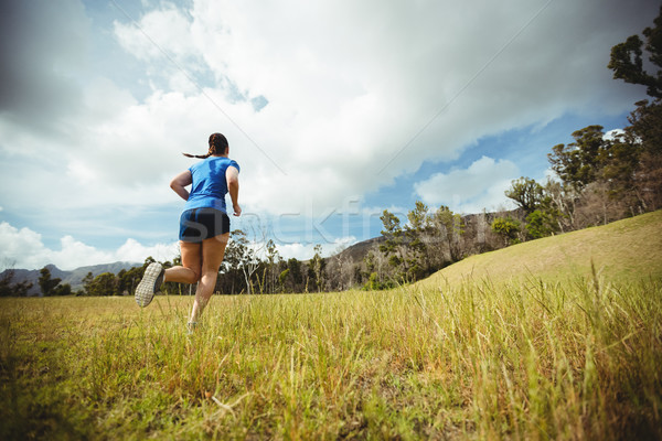 Fit woman running in bootcamp Stock photo © wavebreak_media