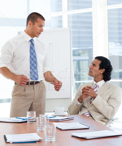 Serious businessman giving a presentation Stock photo © wavebreak_media
