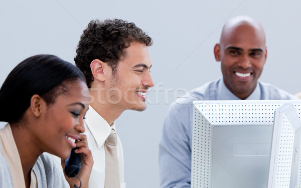 Three business people working in the office Stock photo © wavebreak_media