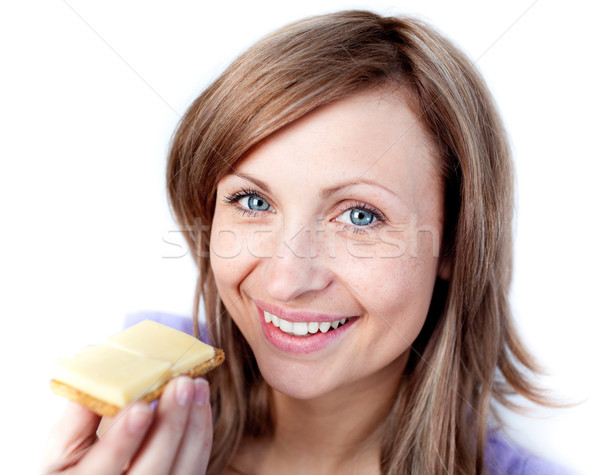 Beautiful woman eating a cracker with cheese Stock photo © wavebreak_media