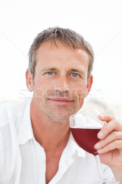 Schöner Mann trinken Rotwein home entspannen Sofa Stock foto © wavebreak_media
