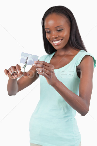 Mosolygó nő vág hitelkártya darabok fehér háttér Stock fotó © wavebreak_media