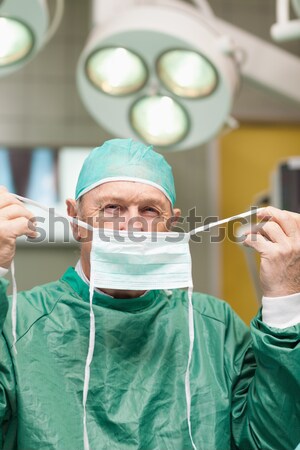 ストックフォト: 外科医 · 外科用メス · 手 · 外科的な · ルーム