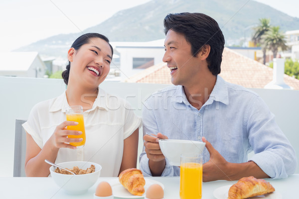 Sorridere Coppia colazione insieme fuori balcone Foto d'archivio © wavebreak_media