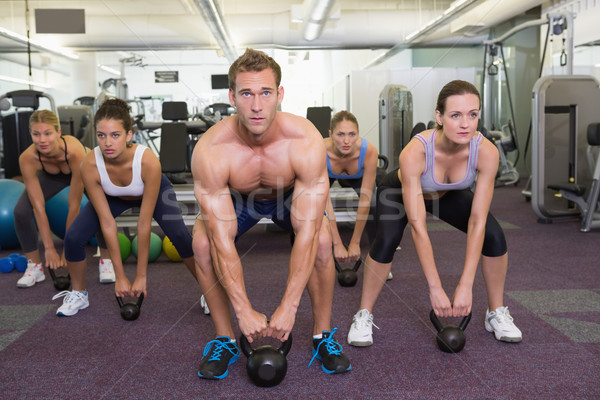 Muskuläre Ausbilder führend Klasse Fitnessstudio Stock foto © wavebreak_media