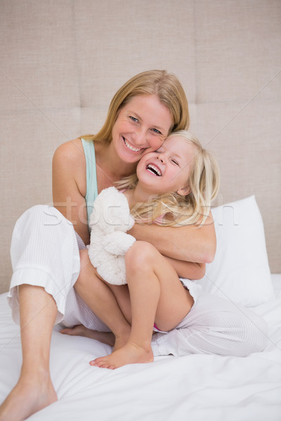 Stockfoto: Cute · meisje · moeder · bed · home · slaapkamer