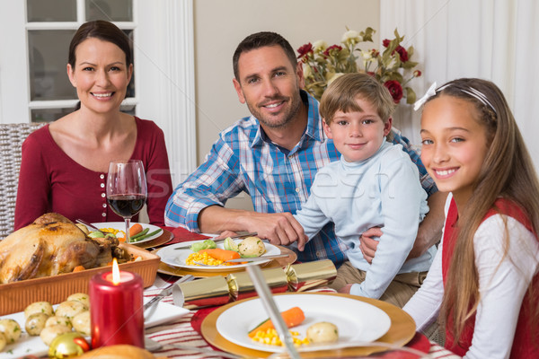 Portrait of smiling family during christmas dinner Stock photo © wavebreak_media