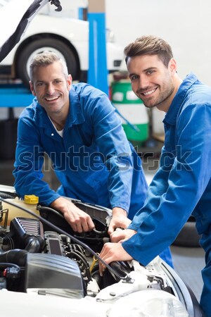 Team of mechanics working together Stock photo © wavebreak_media