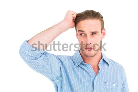Handsome man in shirt thinking with hand on head Stock photo © wavebreak_media