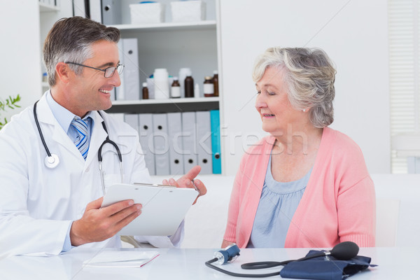 Doctor explaining prescriptions to senior patient Stock photo © wavebreak_media