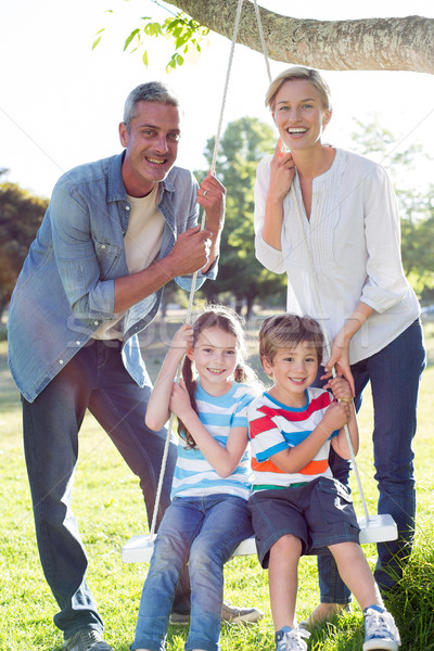 Famille heureuse Swing femme arbre heureux [[stock_photo]] © wavebreak_media