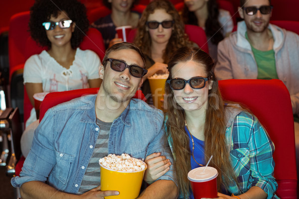 Young friends watching a 3d film Stock photo © wavebreak_media