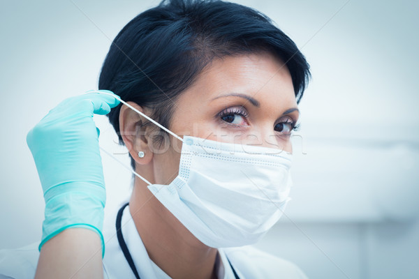 Femenino dentista mascarilla quirúrgica retrato Trabajo Foto stock © wavebreak_media