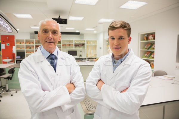 Science student and lecturer smiling at camera Stock photo © wavebreak_media