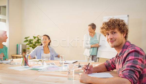 Jeunes designer écouter conférence bureau homme [[stock_photo]] © wavebreak_media