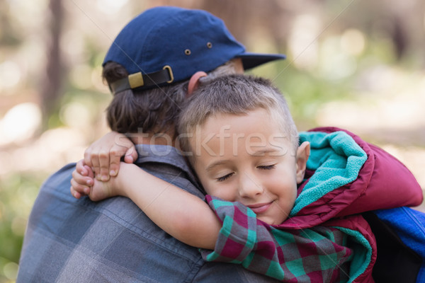 Father and son embracing in forest Stock photo © wavebreak_media