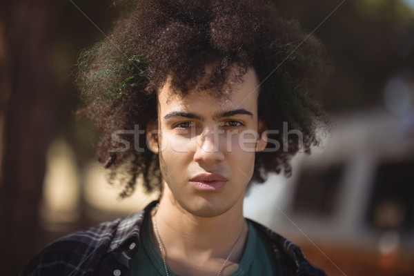 Zdjęcia stock: Portret · człowiek · kręcone · włosy · młody · człowiek · van · lata