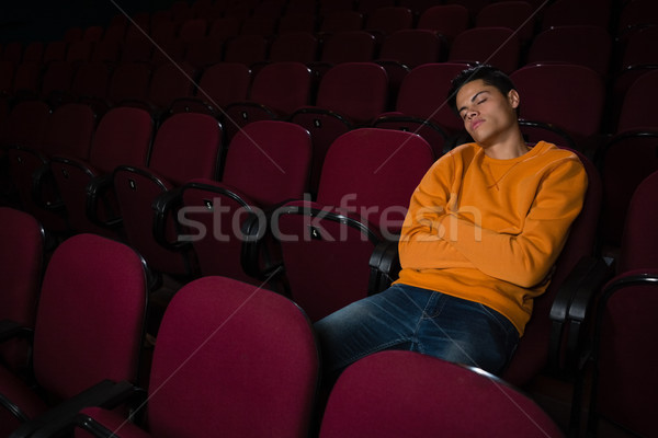 Aburrido hombre dormir película teatro película Foto stock © wavebreak_media