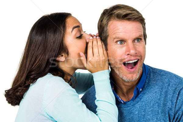 Woman whispering secret with man Stock photo © wavebreak_media