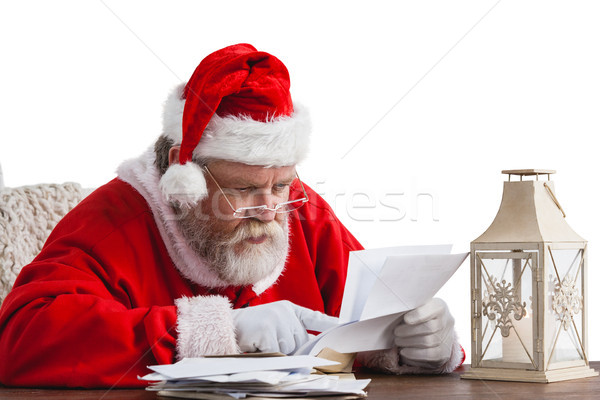Santa claus reading a letter Stock photo © wavebreak_media