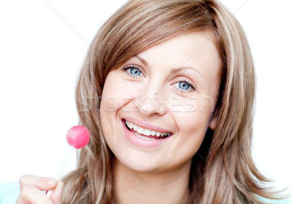 Smiling woman holding a lollipop  Stock photo © wavebreak_media